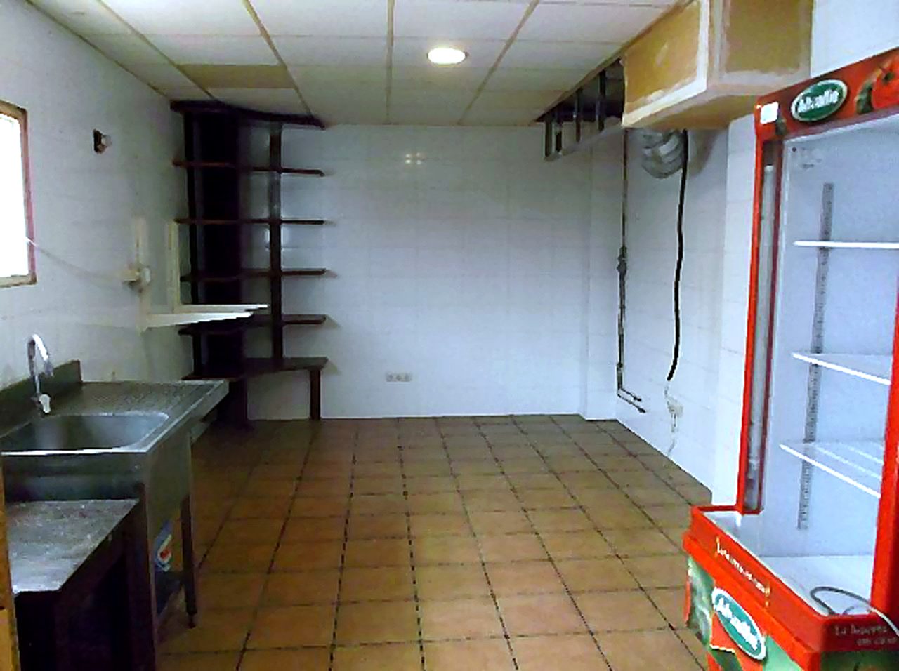 Zona de cocina y preparación del local